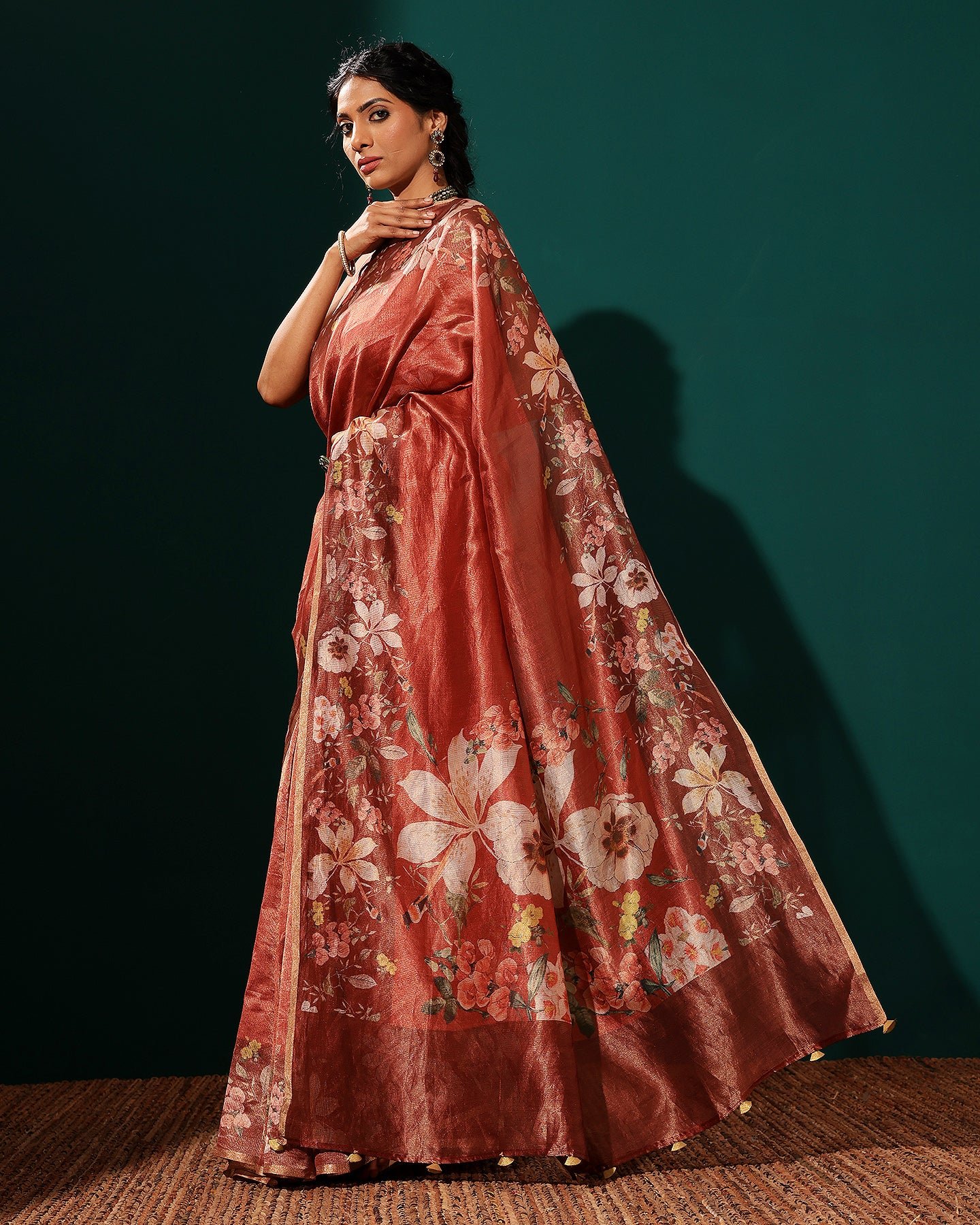 A red-striped silk saree typically features bold - Image 3
